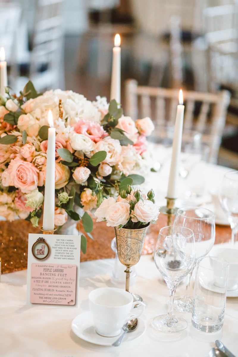 Palm Springs reception tables adorned with desert florals and soft candlelight at dusk